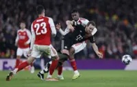 Soccer-No panic, says Kane, as Arsenal inflict first defeat on Bayern