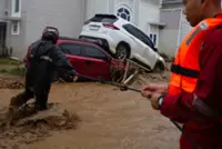 Search for victims intensifies after Sumatra floods and landslides kill 49 people