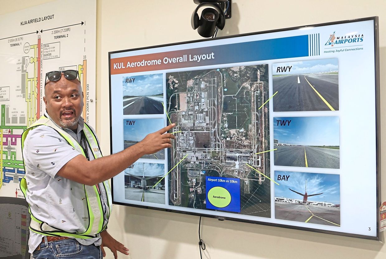 Mohd Redzuan explaining the critical function of the Engineering Airport Pavement team, which is to maintain the structural integrity of every runway, taxiway and apron, among other things. 