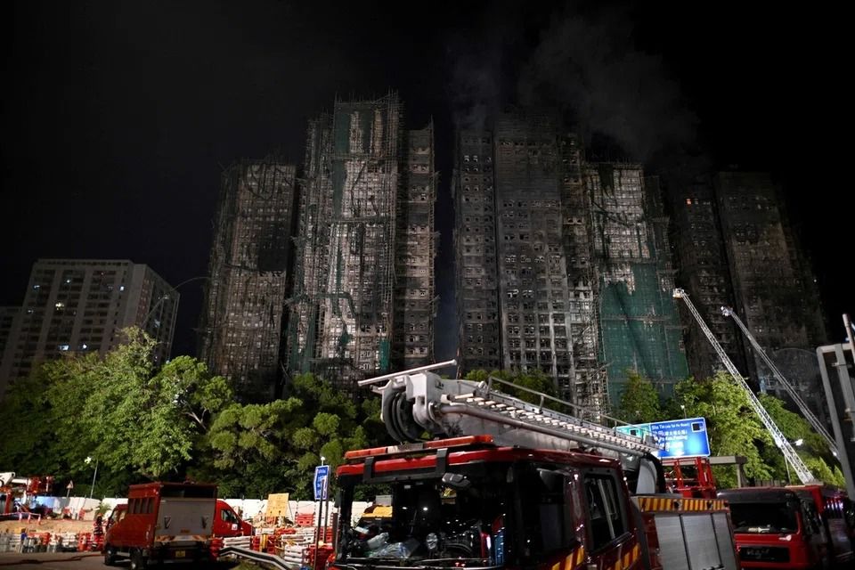 Most of the victims were found in two high-rise blocks in the eight-tower complex, deputy director of fire services Derek Chan said. - Photo: AFP