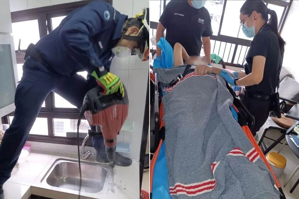 Person with arm stuck in kitchen drain pipe freed after two-hour rescue operation, taken to hospital in Singapore