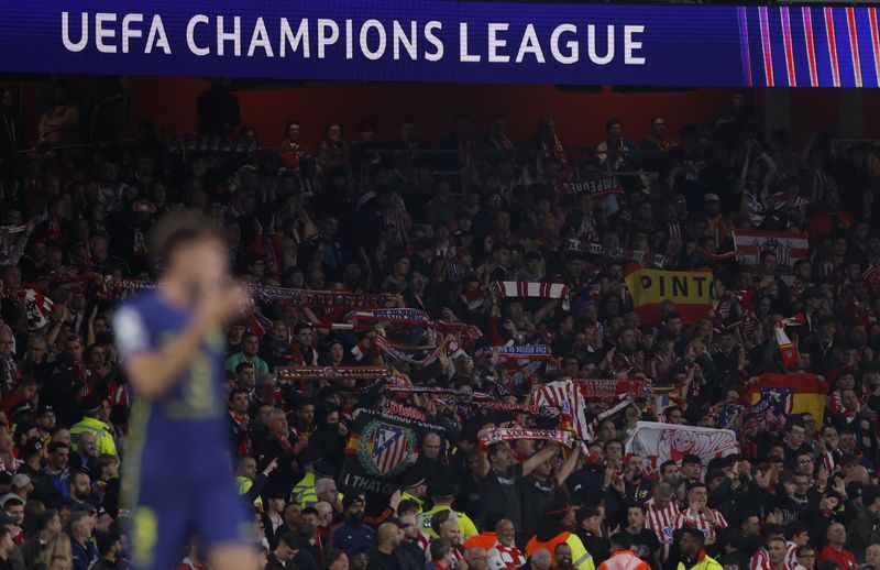 Soccer-Atletico fined for 'racist' behaviour of fans during Arsenal game