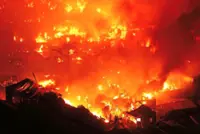 Fire destroys crowded slum leaving thousands homeless