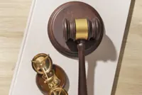 Woman charged with possession of forged passports, counterfeit immigration stamps in Brunei