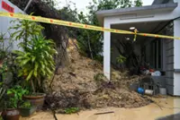 Slope collapse behind house causes panic to Seremban family