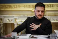 Ukraine's top peace negotiator quits after raid by anti-graft police