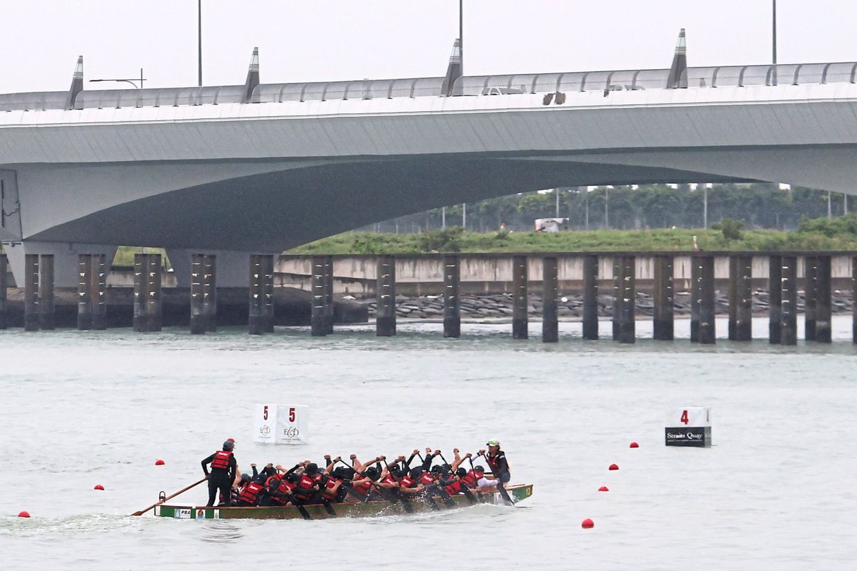 A dragon boat team sharpening their skills during a practice run. — CHAN BOON KAI/The Star