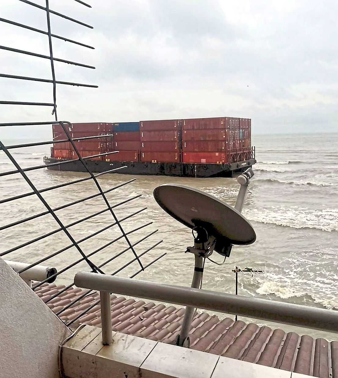 A container barge is believed to have run aground off Port Dickson during the storm. — Bernama 