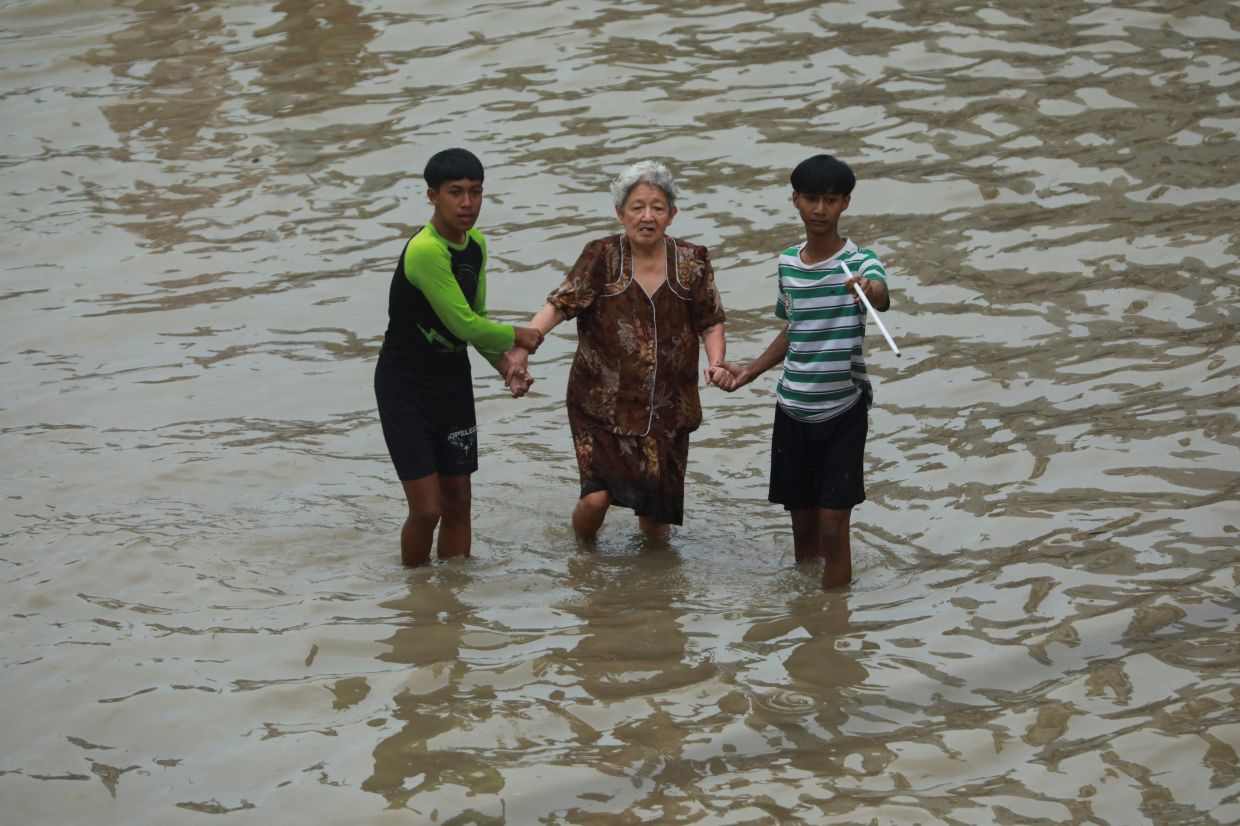 Death toll from floods and landslides on Indonesia's Sumatra island rises to 164