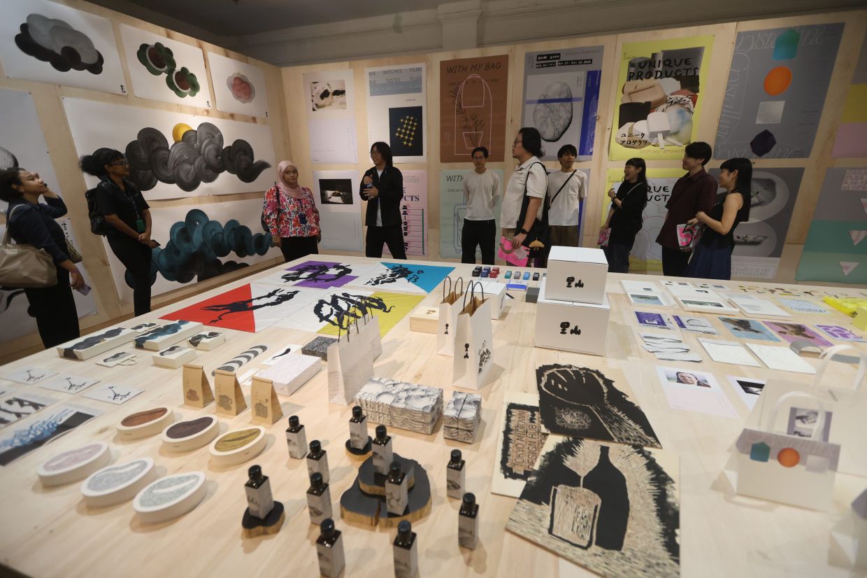 One major highlight is the graphic design exhibition by the 2025 JAGDA New Designer Award recipients from Japan, featuring a selection of their award-winning works. Photo: The Star/Low Boon Tat
