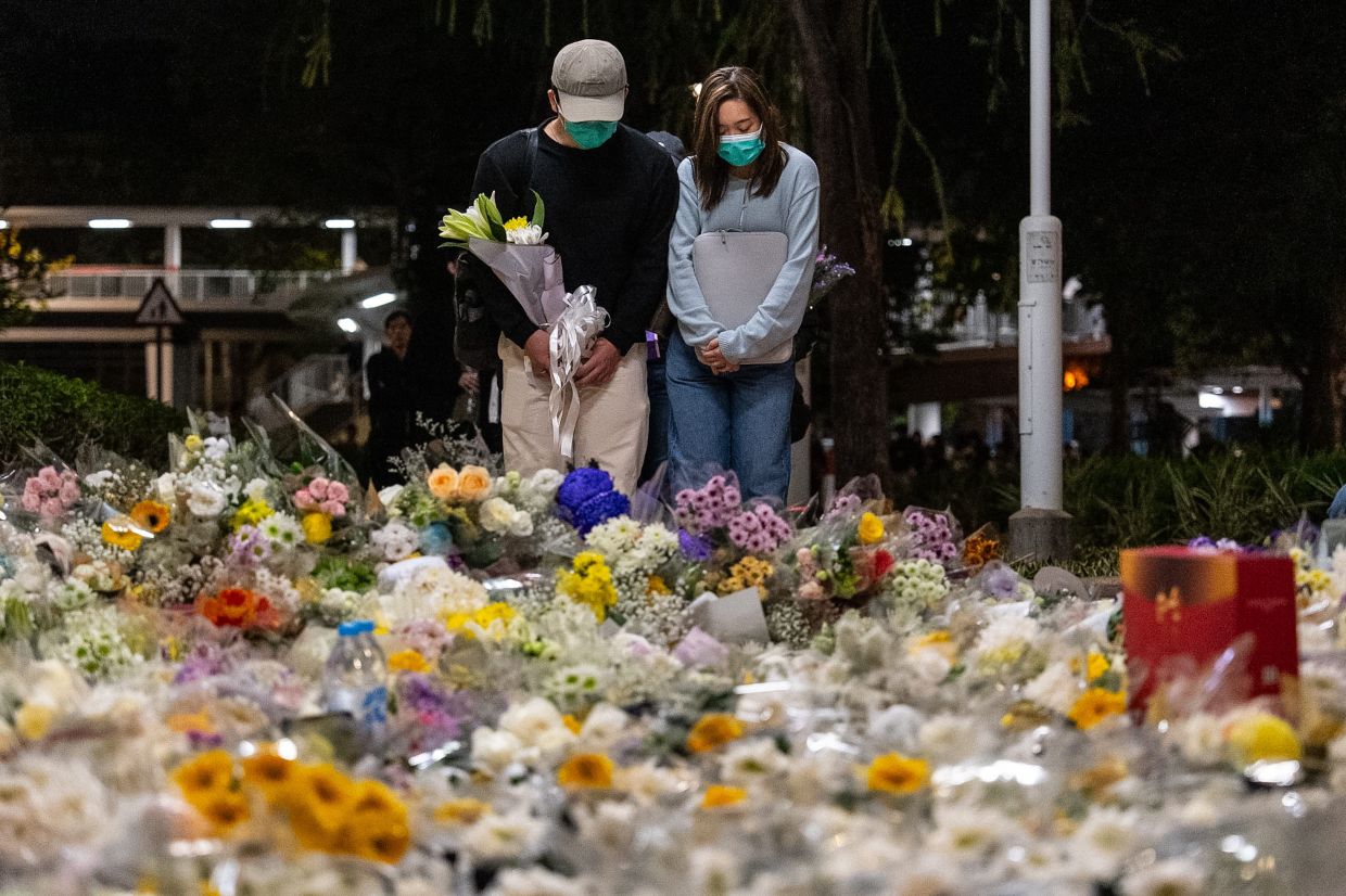 Factbox - How does the Hong Kong tower fire compare to other recent building blazes?