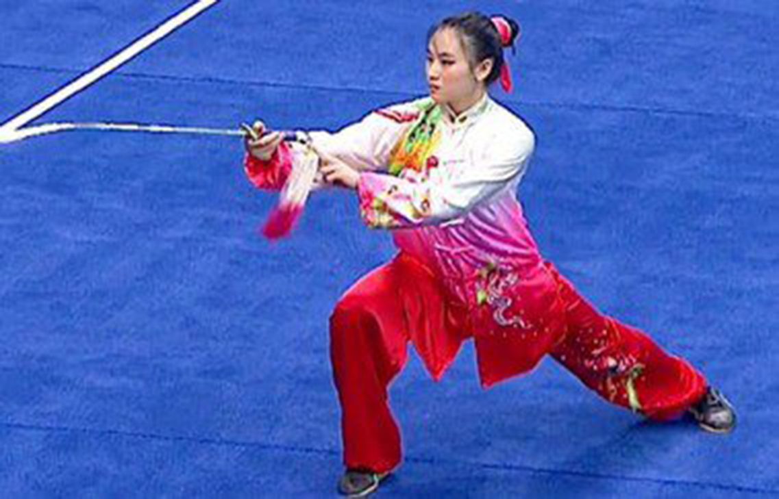 Right: Kwang Yong Xin came out victorious in the girls’ 42 form taijiquan and taijijian combined event.