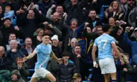 Soccer-Foden double gets shaky Man City back on track, Sunderland go fourth
