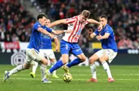 Soccer-Sorloth double fires Atletico past bottom side Oviedo