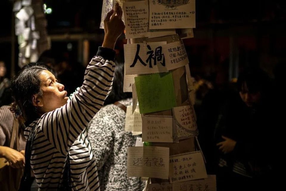 Hong Kong acts to quell anger after deadly building blaze, with at least 176 people confirmed dead