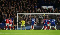 Soccer-Ten-man Chelsea hold Arsenal in tetchy 1-1 London derby