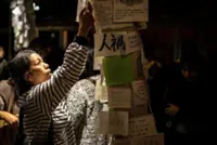 Hong Kong acts to quell anger after deadly building blaze, with at least 176 people confirmed dead