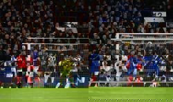 Soccer-Ten-man Chelsea hold Arsenal in tetchy 1-1 London derby