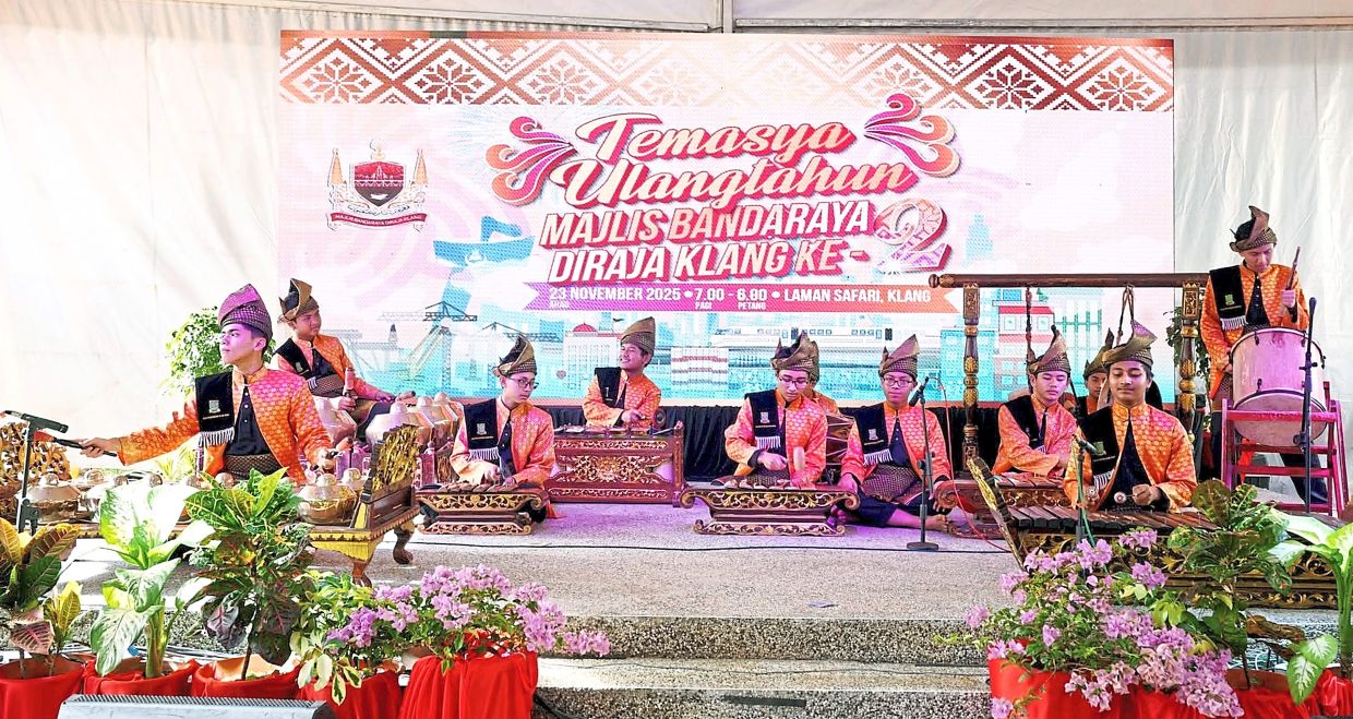 A traditional Malay music ensemble performing at the celebration attended by thousands. 