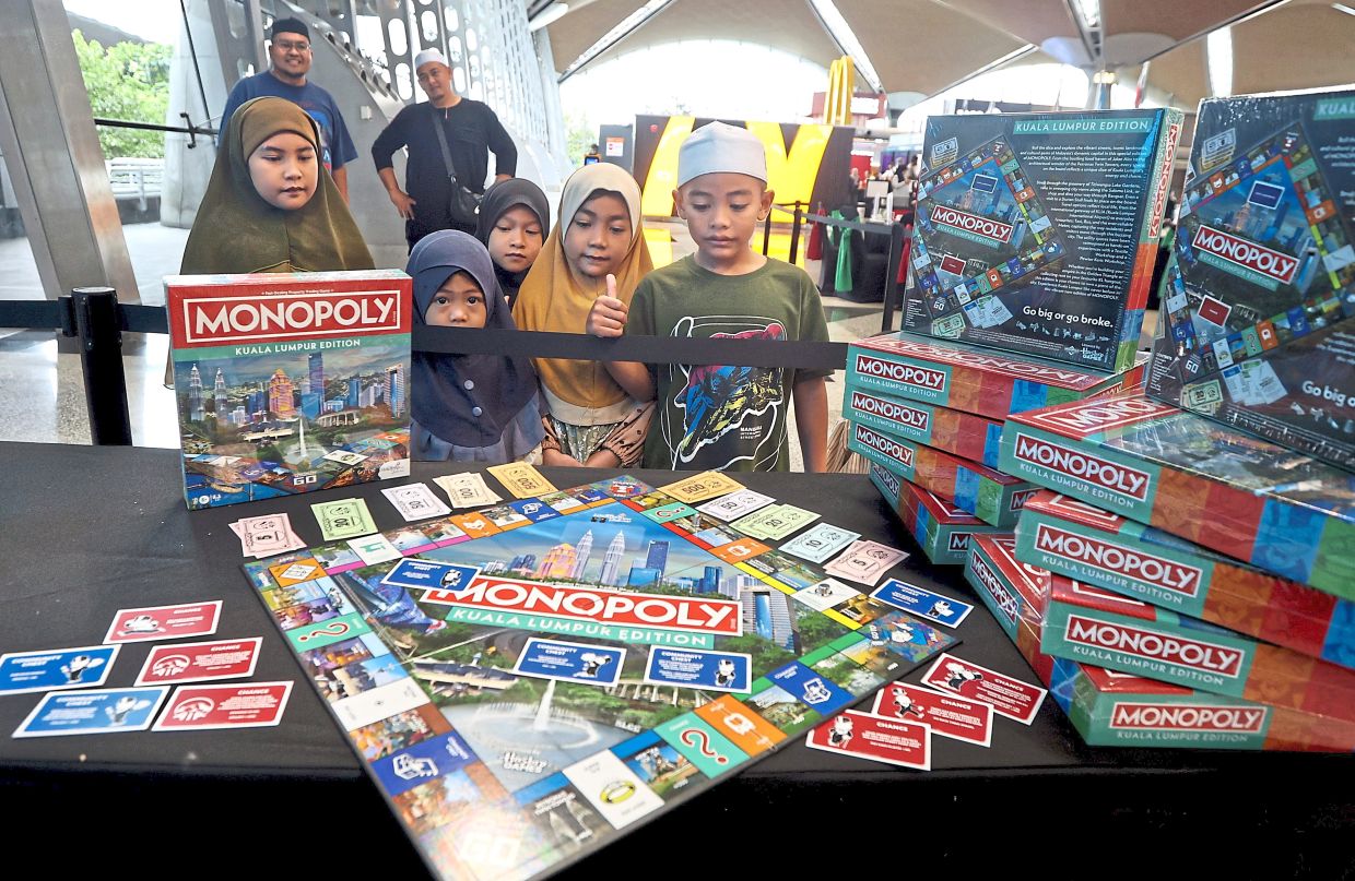 Children checking out the Monopoly Kuala Lumpur Edition which was launched at KLIA Terminal 1.