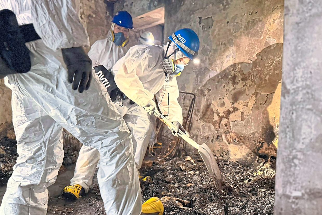 Crews scour last burnt-out towers