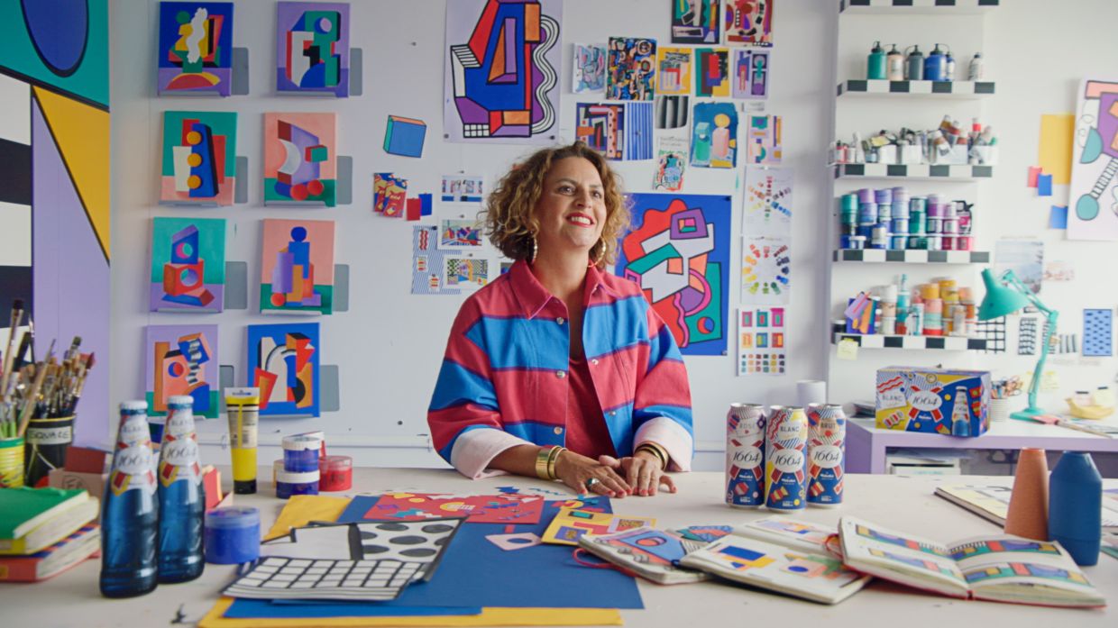 Walala's bold use of colour and vibrant geometric patterns brings a fresh, contemporary twist to the 1664 cans.'