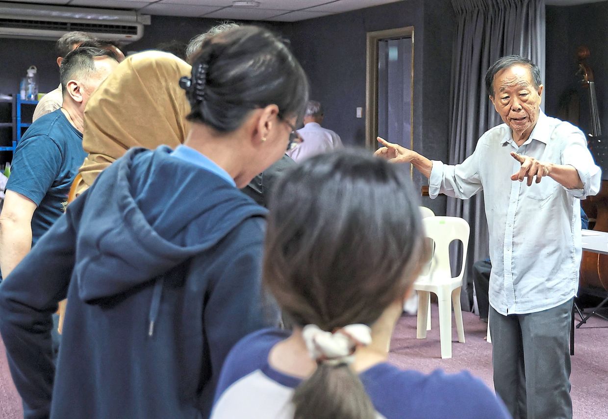 Playwright and director Chin San Sooi (right) rehearsing with the cast of 'Kapitan – The Musical'. Photo: The Star/Muhamad Shahril Rosli 