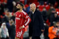Soccer-Slot tight-lipped over Salah's return to Liverpool team