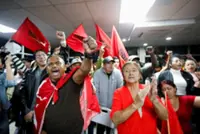 Centrist Nasralla takes slim lead in Honduran presidential election plagued by delays as Trump alleges fraud