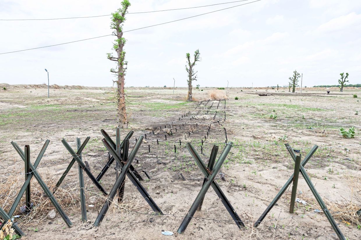 A general view of barbed wire at the entrance to Monguno, Borno state, Nigeria. — AFP