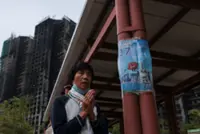 'Highly traumatised': Hong Kong presses ahead with elections after deadly fire