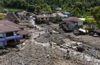Flood-hit Indonesian regions run low on fuel, funds for relief effort