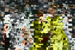 Soccer-Romero scores twice as Spurs grab 2-2 draw at Newcastle