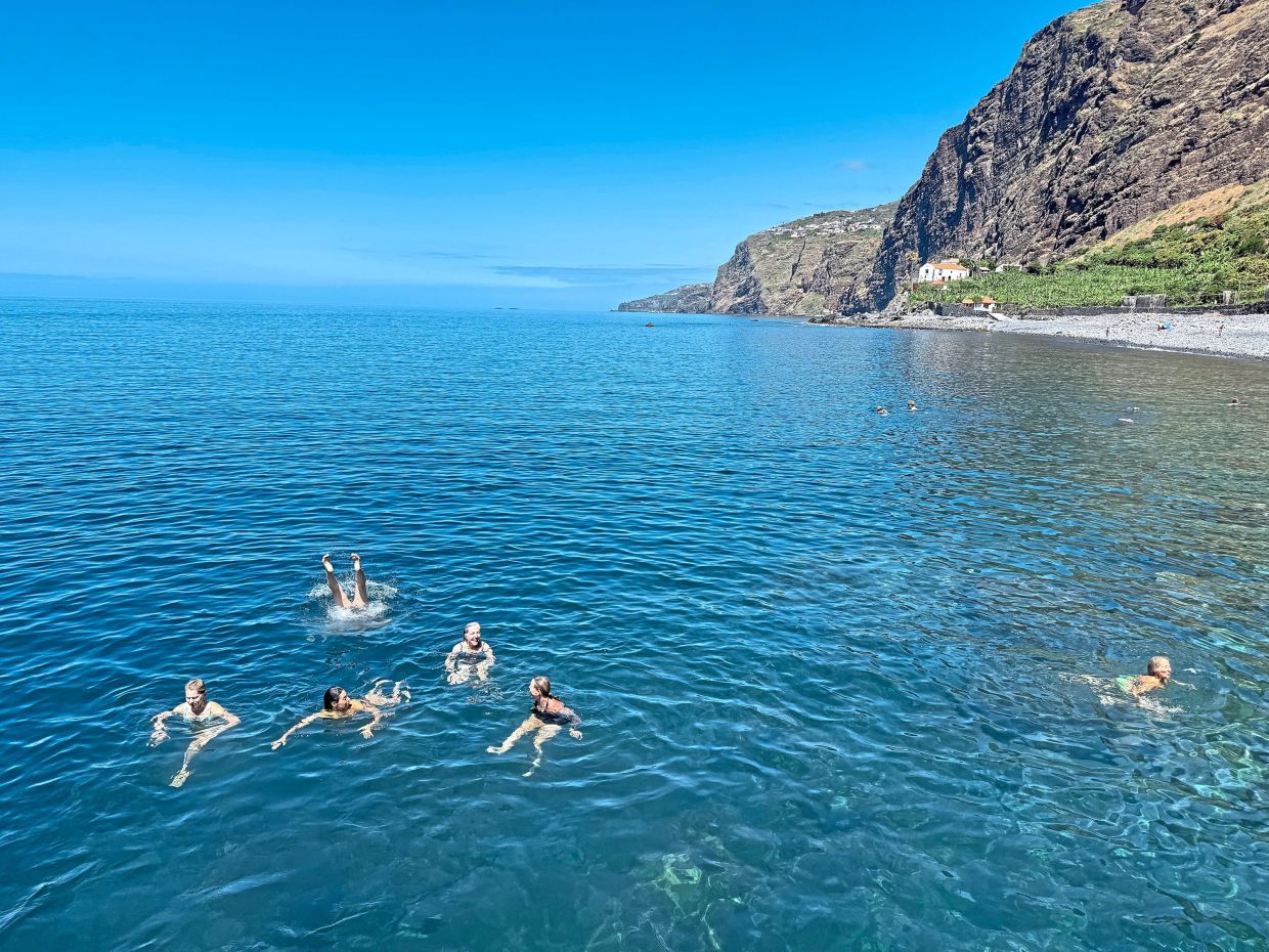 Cooling off with a dip in the ocean during a visit to Faja dos Padres, an organic farm that’s only accessible by boat or with a cable car ride down the sheer rock face of a mountain.