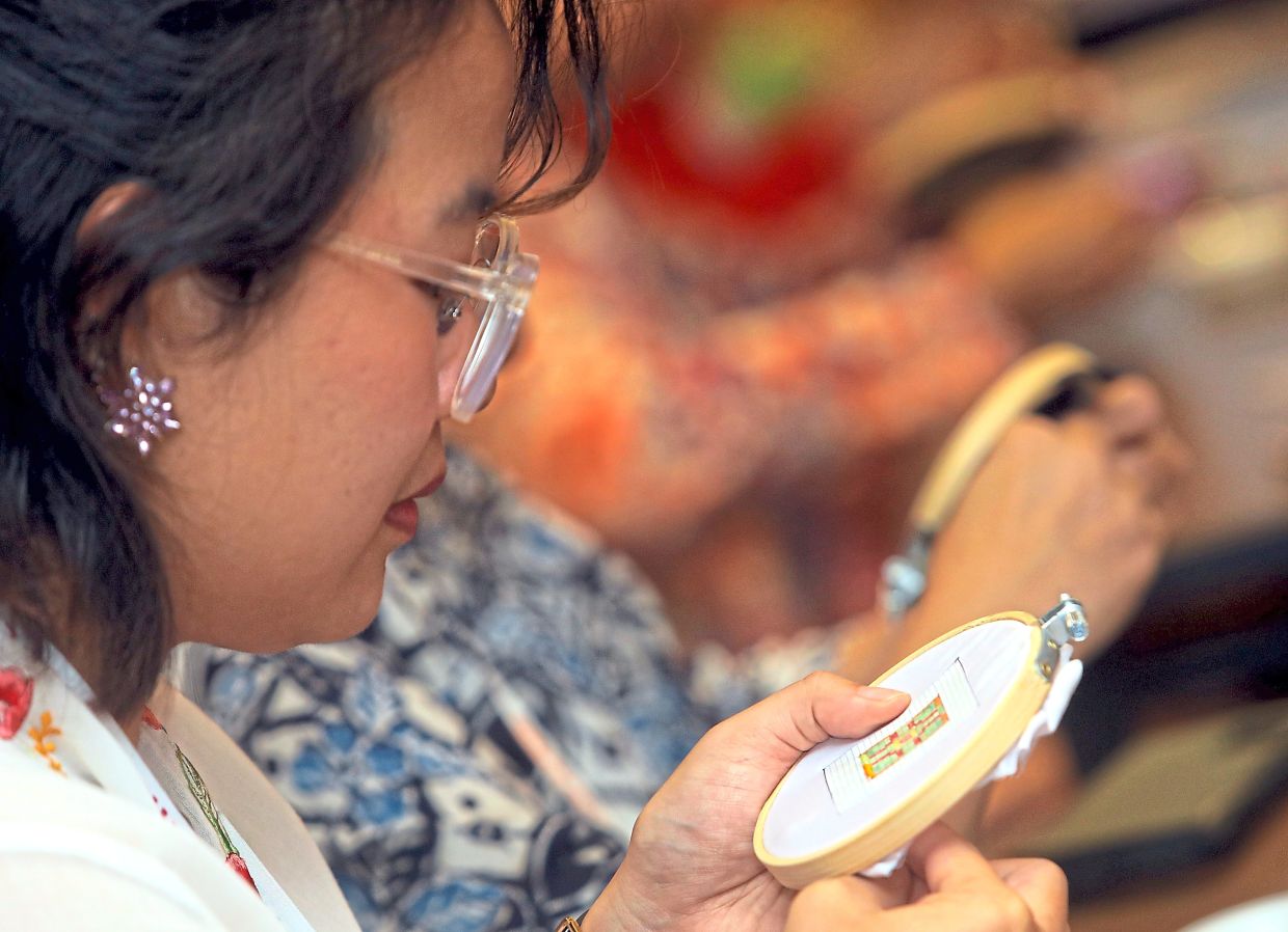 Hands-on beadwork sessions gave participants a chance to experience this unique Peranakan craft.