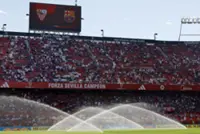 Soccer-Sevilla stadium partially closed after fans throw objects in derby