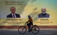 Russia's Putin arrives in India for summit talks with PM Modi