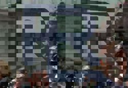 Olympics-Ralph Lauren outfits US athletes for 10th Games