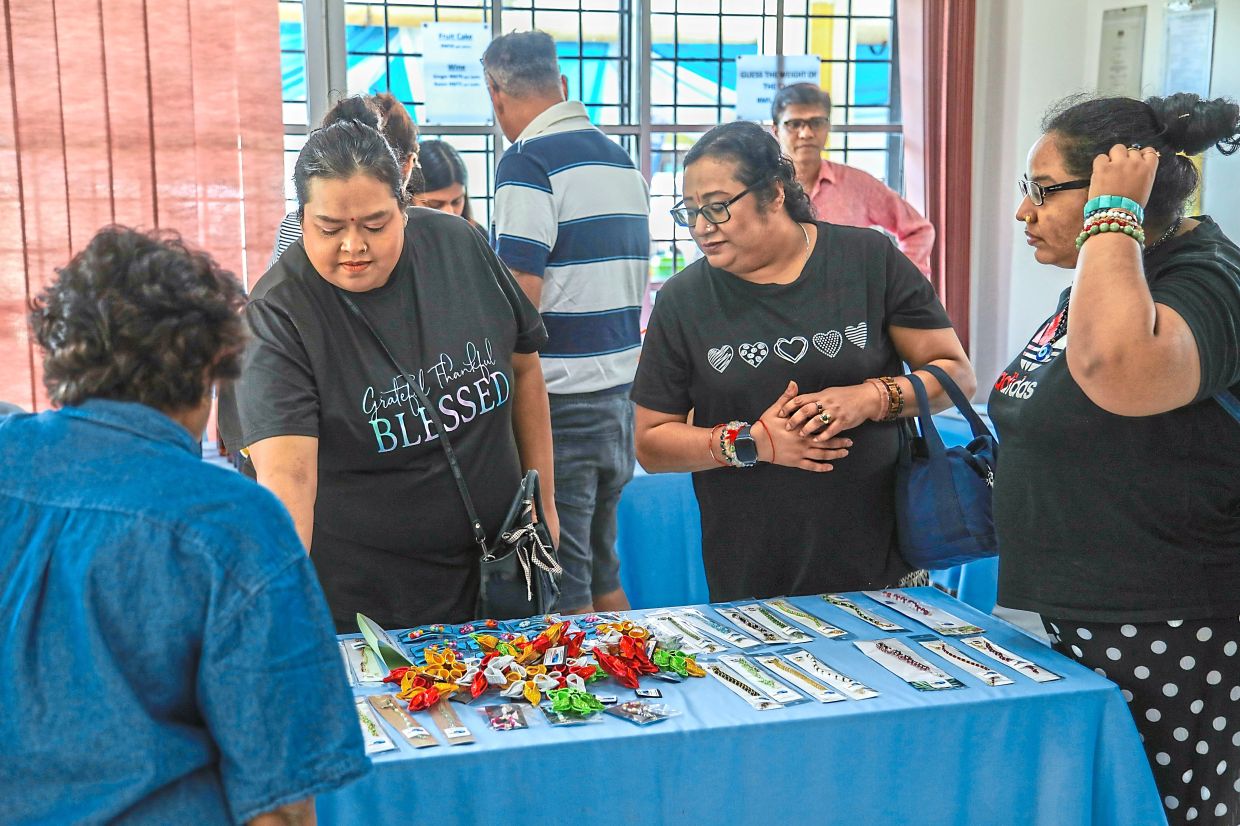 Visitors checking out handmade crafts created by adults with autism at the charity bazaar held at SEA Club’s centre in Section 4, Petaling Jaya. 