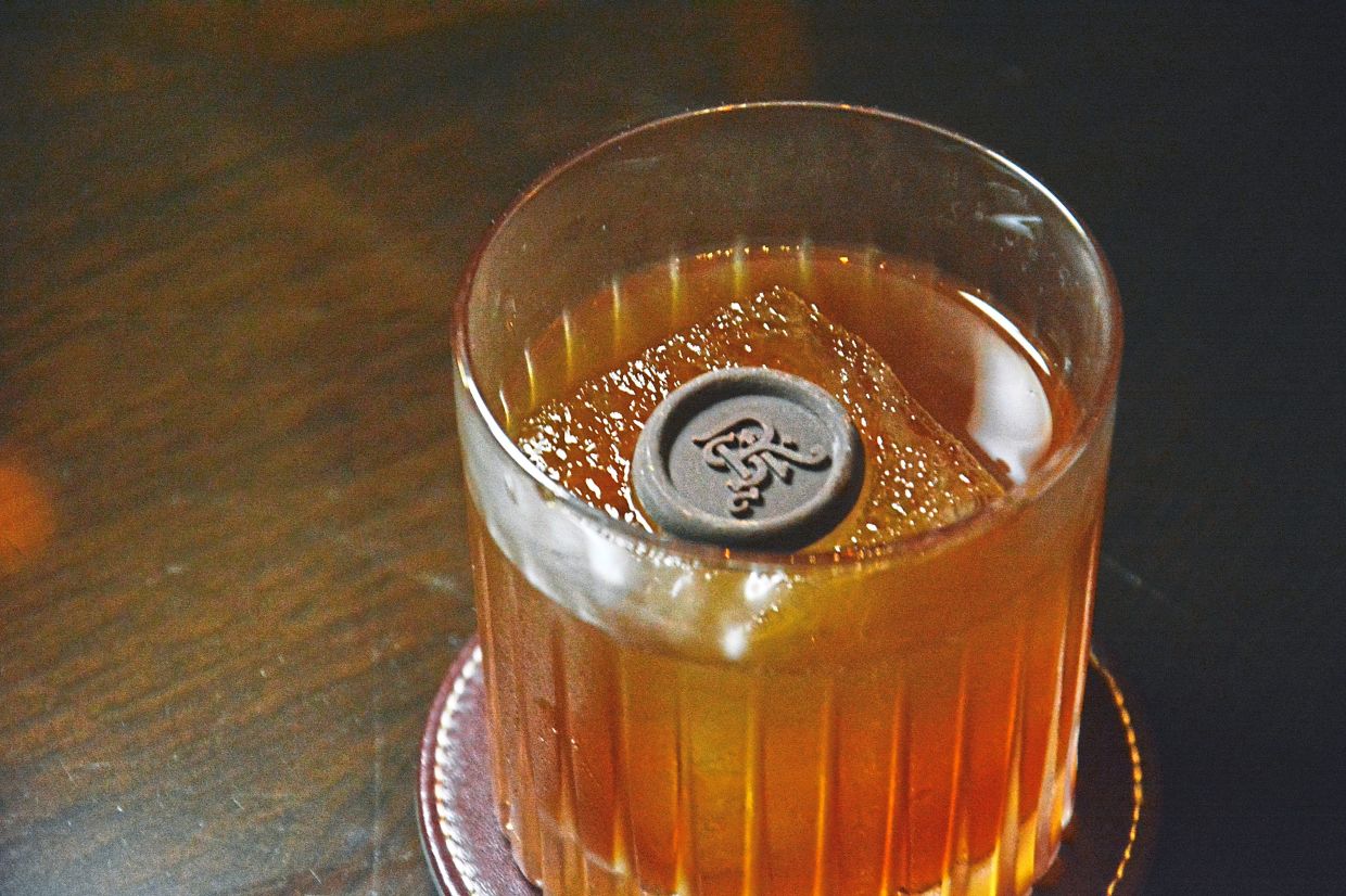 The writer’s personal favourite cocktail, White Dove, is topped with chocolate bearing the St Regis’ emblem.