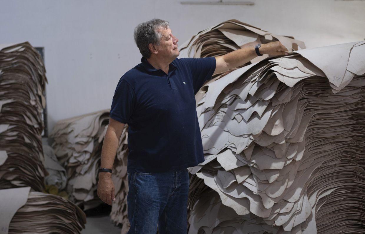 This man is known as the 'leather whisperer' for luxury fashion brands