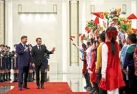 Macron pushes Xi on ceasefire, ties