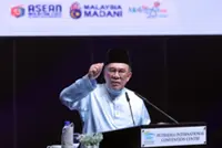 Anwar vows no protection for staff linked to corruption