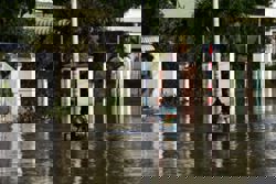 Flooding kills two as Vietnam hit by dozens of landslides