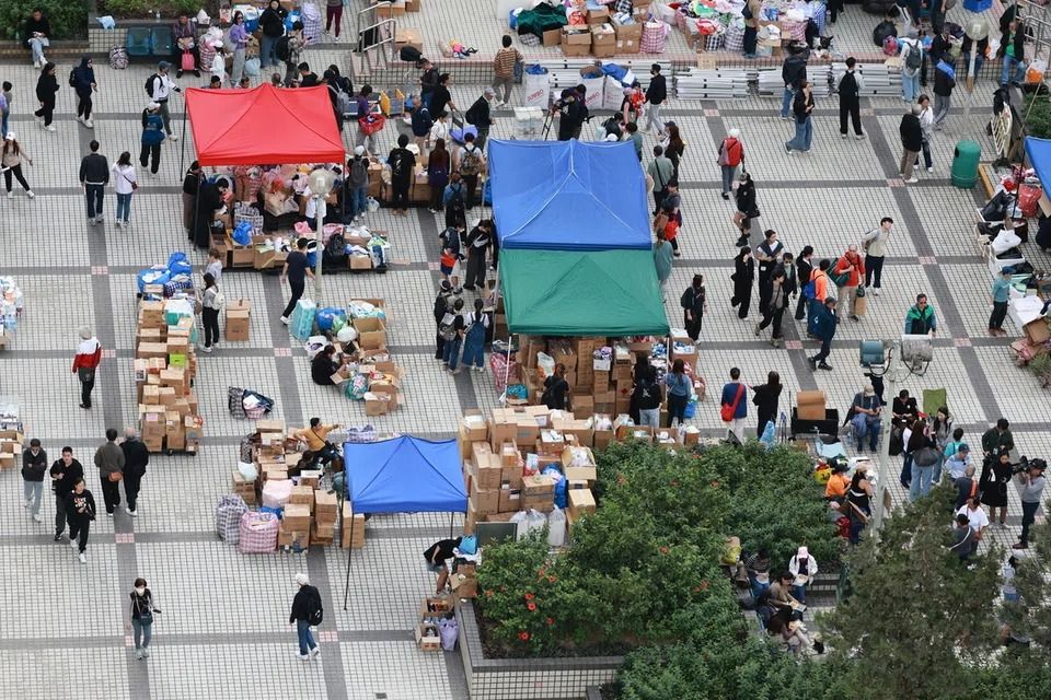 Volunteers organising aid distribution for residents affected by the Tai Po apartment fire on Nov 28. - Photo: EPA