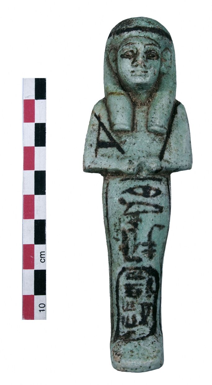 This undated handout photograph released shows a funerary statuette found in the royal necropolis of Tanis (San el-Hagar). Photo: AFP 