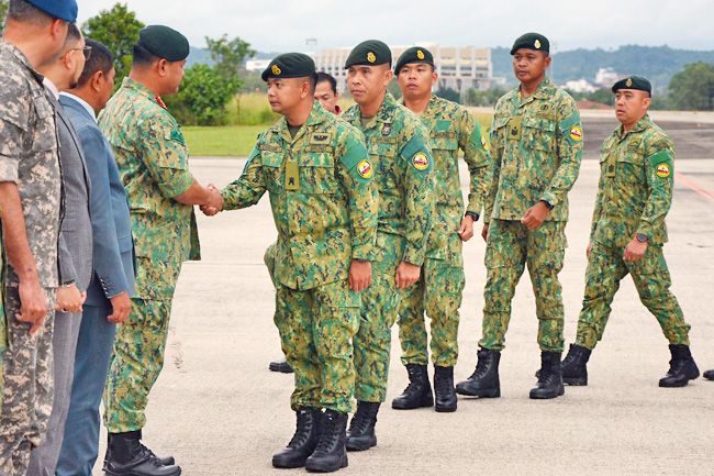 Royal Brunei Armed Forces personnel return after successful peacekeeping mission in Lebanon