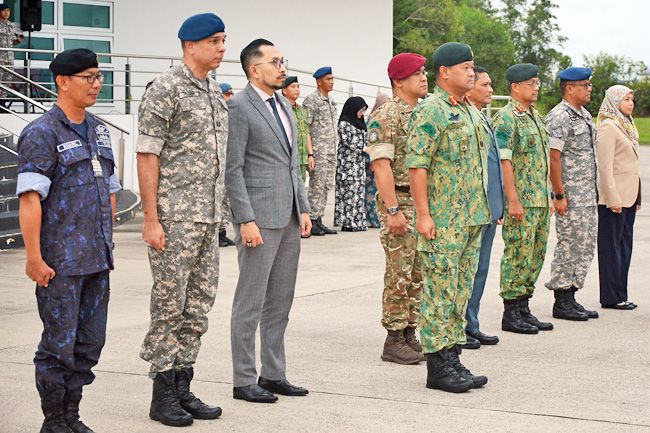 Major General Muhammad Haszaimiawaits for the arrival of the RBAF contingent. - Photo: Borneo Bulletin/ANN