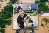 Thai woman stays on rooftop with pets for days during floods, refusing rescue without them