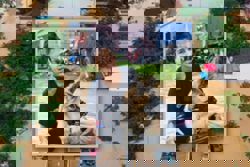 Thai woman stays on rooftop with pets for days during floods, refusing rescue without them